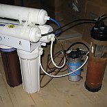 Système d'osmose avec pompe de surpression 